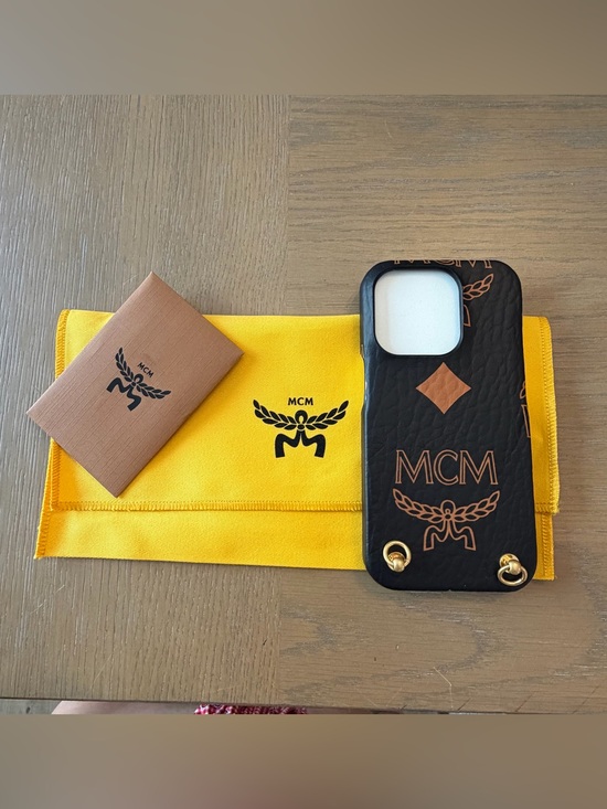 MCM Accessories - MCM Logo Leather iPhone 15 pro Case with Gold Hardware